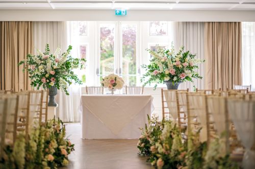 Ballroom ceremony at Manor By The Lake