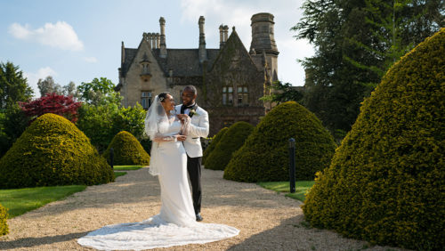 bride and groom at manor by the lake