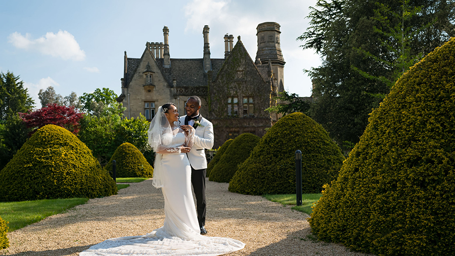 Bride and groom at manor by the lake