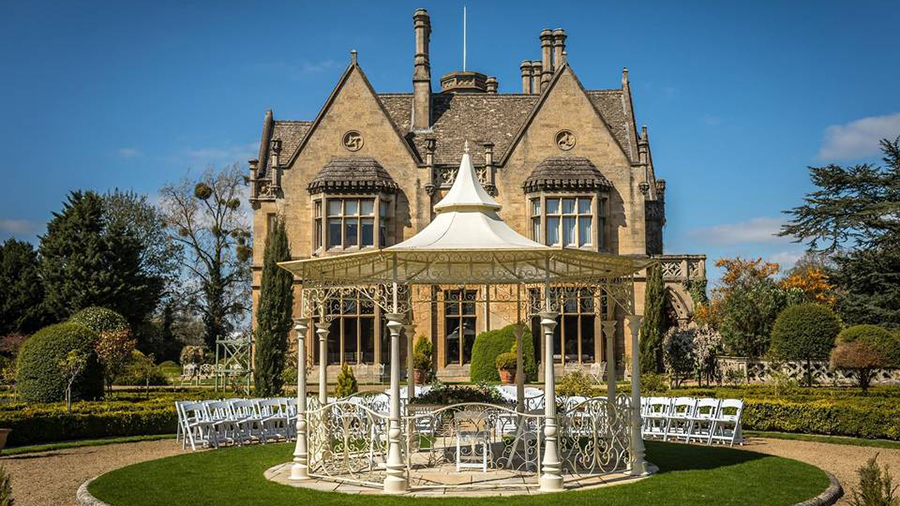 Outdoor ceremony at manor by the lake