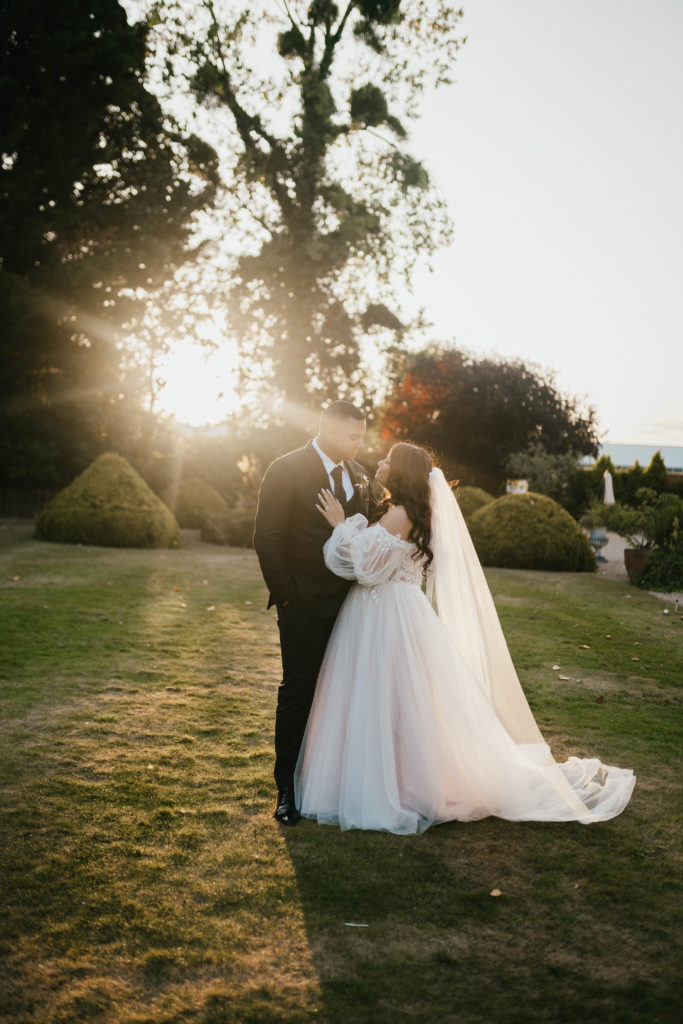 dusk wedding at manor by the lake
